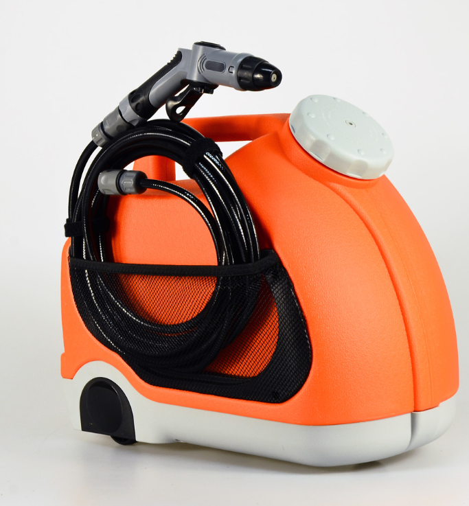 12V portable orange pressure washer cleaning an outdoor air conditioner unit with 15L water tank and adjustable spray gun