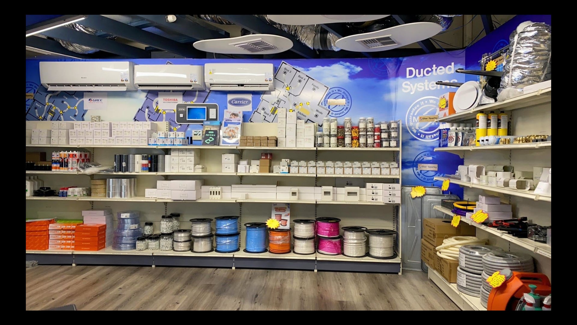 Store interior with HVAC equipment and supplies on shelves